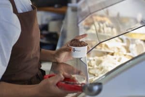 young woman working in ice cream parlour filling 2024 09 17 07 27 29 utc