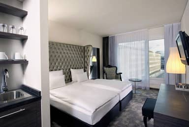 ARCOTEL John F